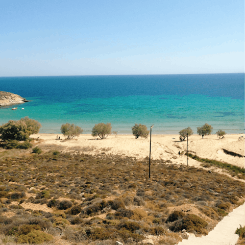 Take a stroll to Mikri Vigla beach to enjoy swimming and watersports