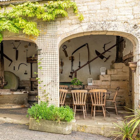 Enjoy an alfresco meal and a local brew in the covered cider press