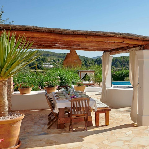 Nibble on Ibizan cuisine under the covered terrace