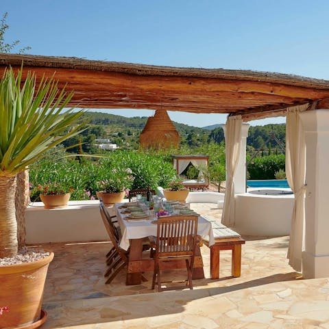 Nibble on Ibizan cuisine under the covered terrace