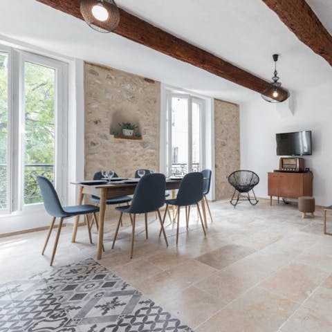 Sit down for a delicious meal at the spacious dining table