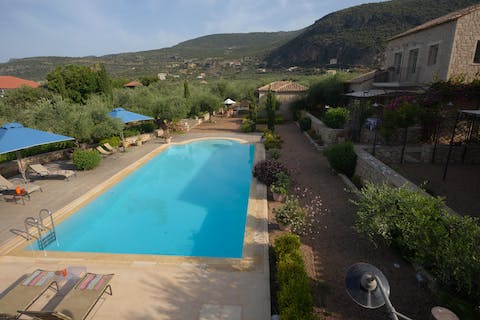 Glide gracefully through the villa's swimming pool and gaze out at the Peloponnese countryside