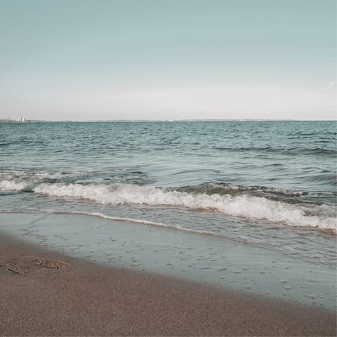 Wander down to Ritsa Beach in less than two minutes and swim in the Aegean Sea