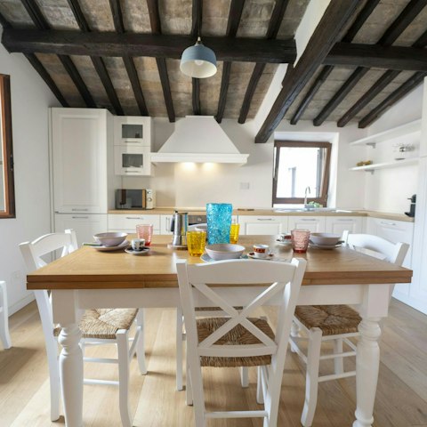 Enjoy a morning espresso and plan your day at the dining table