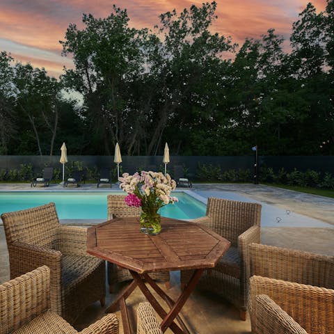 Enjoy a glass of wine while watching the sunset