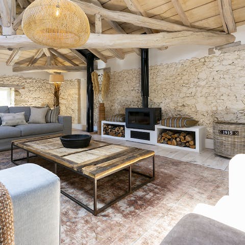 Keep the living room cosy-warm with a fire in the wood-burning stove