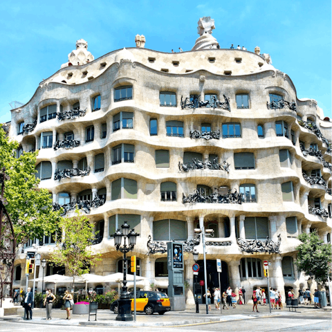 See the iconic La Pedrera-Casa Milà, only a short walk away
