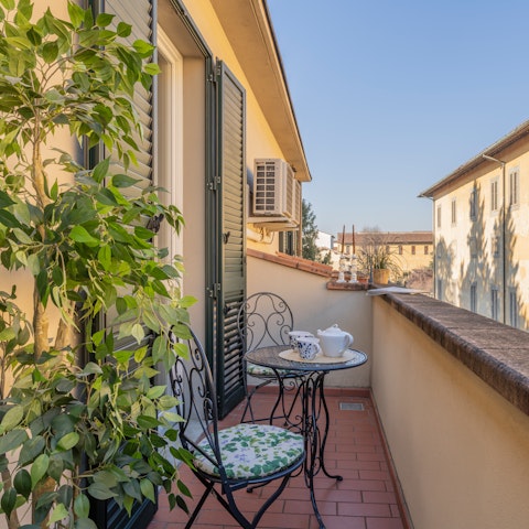 Relax with a glass of Italian wine on one of two private terraces