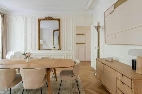Linger over long dinners in a room full of Parisian character