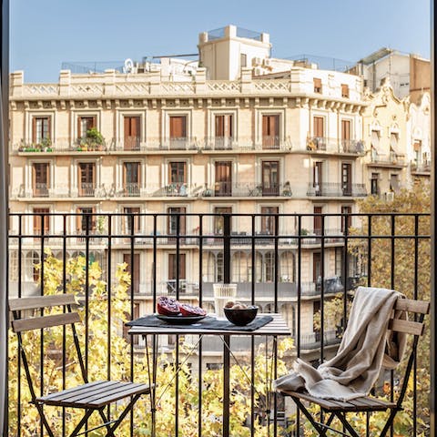 Sip a glass of wine on your private balcony at sundown