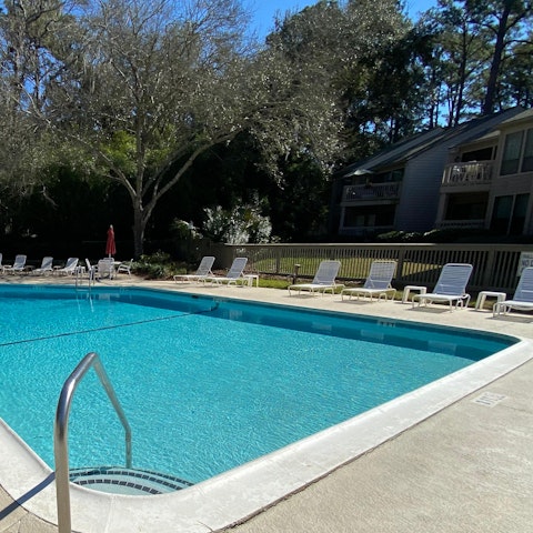 Spend a lazy afternoon lounging by the communal pool