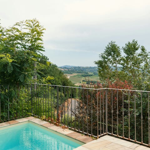Enjoy countryside views from the poolside