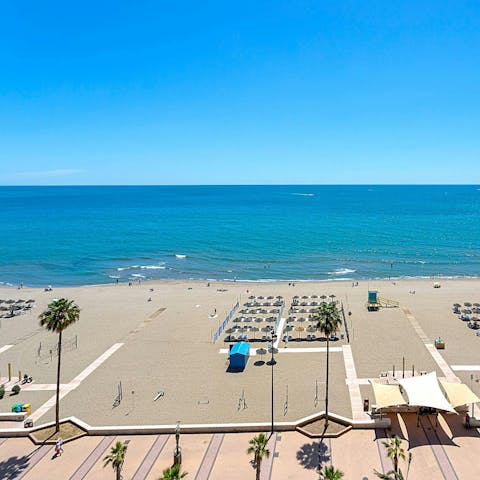 Admire views of the beach from the private terrace