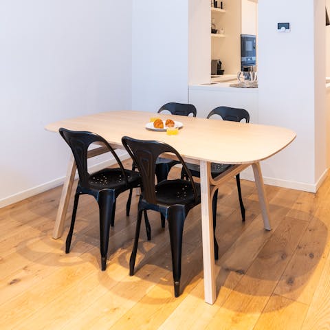 Enjoy a morning espresso and plan out the day at the dining table