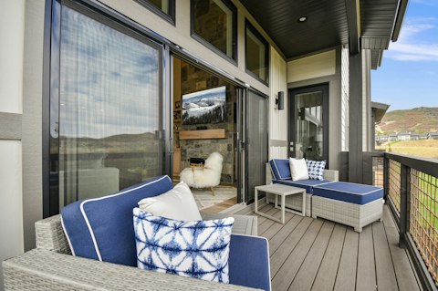 Stretch out on the deck with a drink and open mountain views