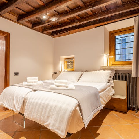 Fall asleep beneath the beautiful beams in the bedrooms