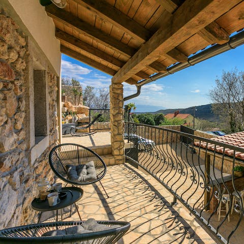 Watch the world go by from the comfy chairs