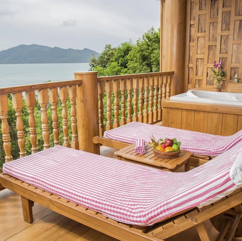 Lounge about and enjoy the view or soak in the outdoor tub