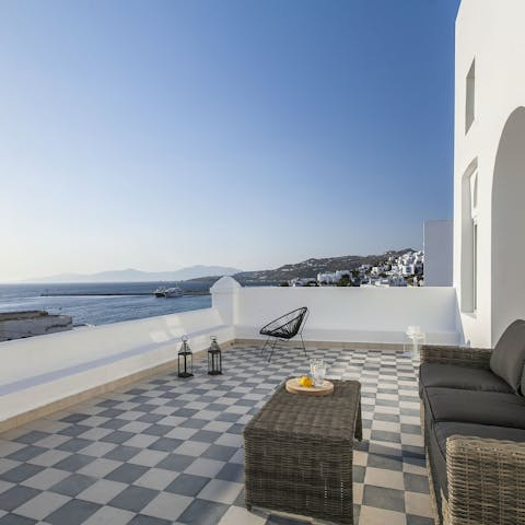 Drink in the sea views over a bottle of wine on the terrace