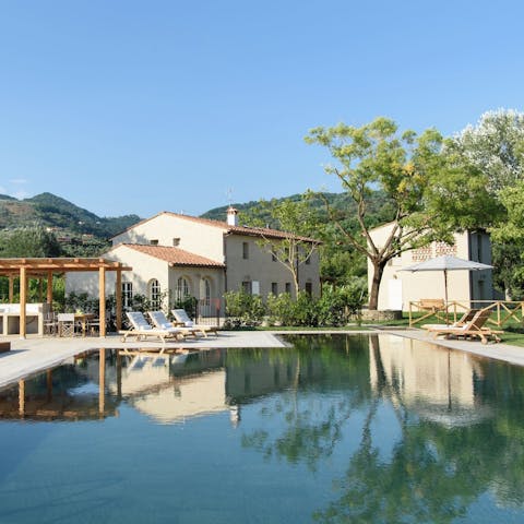 Soak up the Italian sun by the private pool