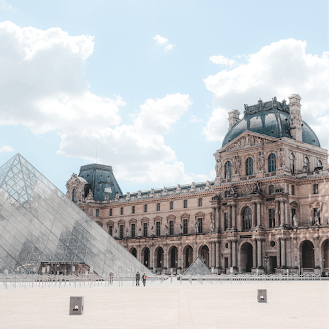 Visit the iconic Louvre museum, a fifteen-minute walk away