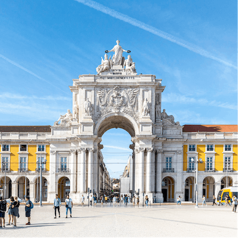 Stroll around bustling Praça do Comércio, a one-minute walk away