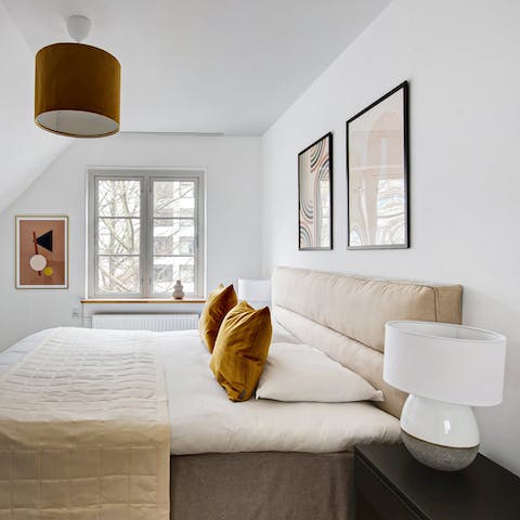 Drift off to sleep in the serene bedrooms