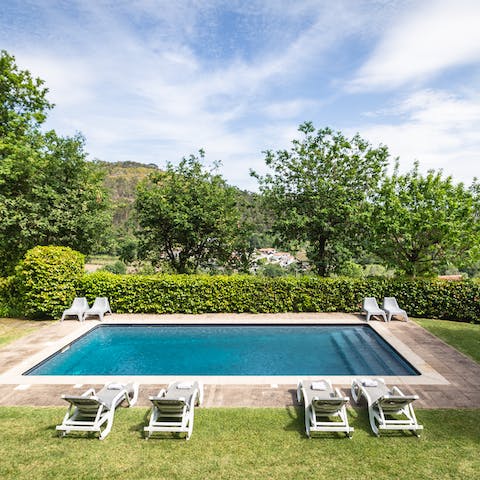 Step into your pristine private pool or sun yourself on the loungers