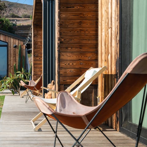 Bag the best seats in the house out on the terrace deck and watch the sun go down