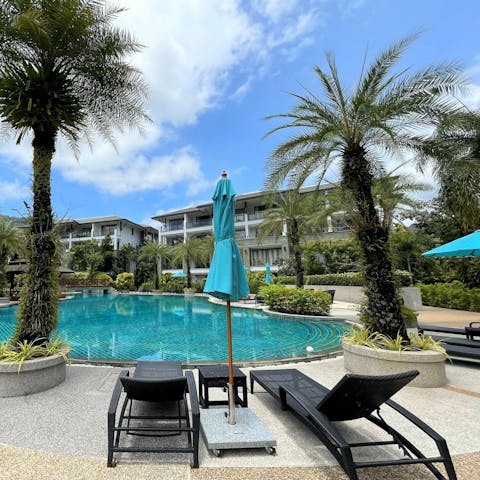 Soak up the sun by the shared swimming pool