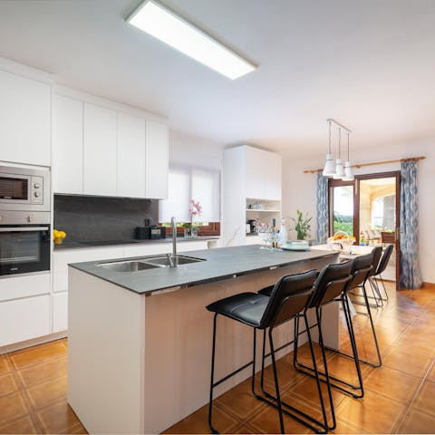 Rustle up breakfast in the smart, light-filled kitchen