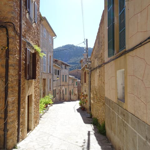 Explore the historic streets of Pollença, just a twenty-minute drive away