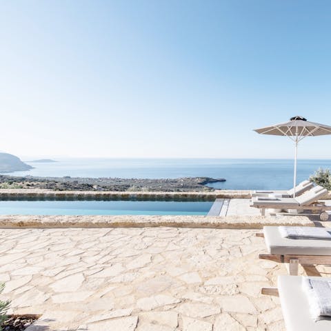 Sip a refresher poolside before diving into the pool