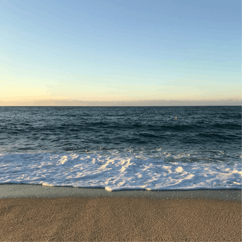 Sink your feet into the sandy shores of nearby Playa Rocas del Cura