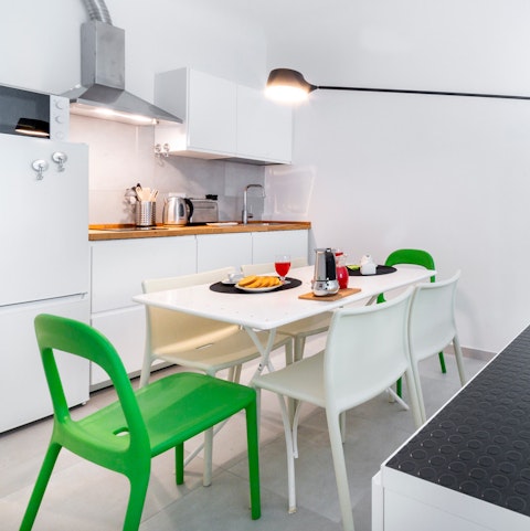Enjoy an espresso and prepare for the day at the dining table
