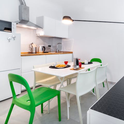 Enjoy an espresso and prepare for the day at the dining table