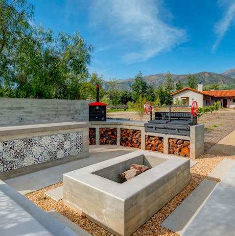Make the most of the outdoor cooking area with its own fire pit