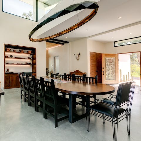 Enjoy lavish meals together around the impressive dining table