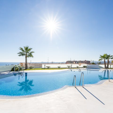 Head down to the communal pool for a dip in the calm waters under the hot sun