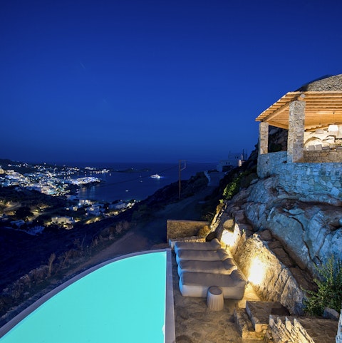 Take in the stunning clifftop views day and night from the infinity pool, sun deck, and covered patio