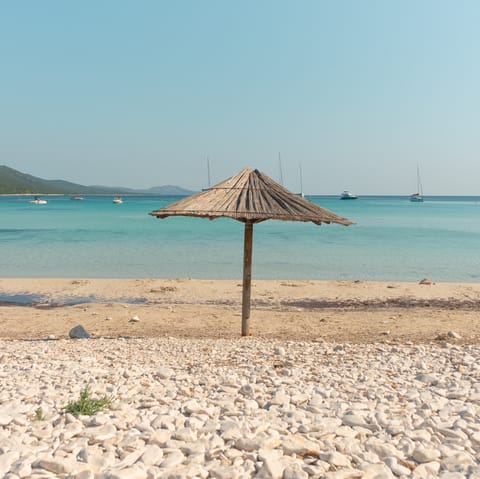 Spend an afternoon lounging on the shores of Sikamia Beach, less than a twenty-minute drive away