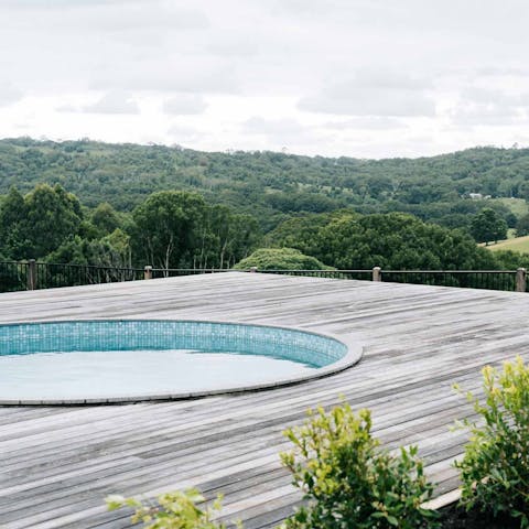 Take a dip in the plunge pool with a view of the meadow