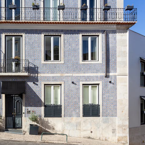 Stay in a gorgeous building covered in patterned tiles