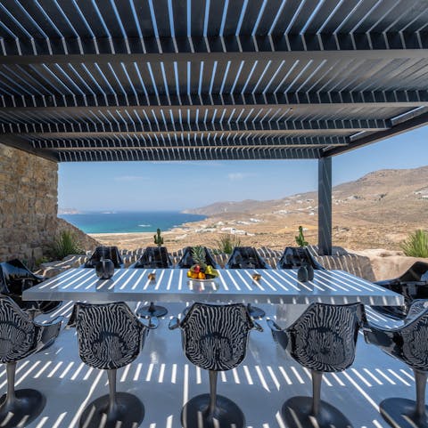 Tuck into moussaka on the covered terrace