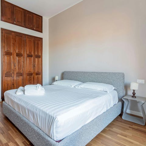 Sink into the comfortable bed after a busy day of sightseeing