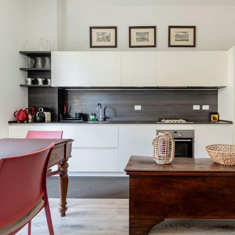 Prepare espresso and cornetti in the sleek kitchen