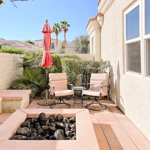 Enjoy a glass of wine around the private fire pit in the evenings