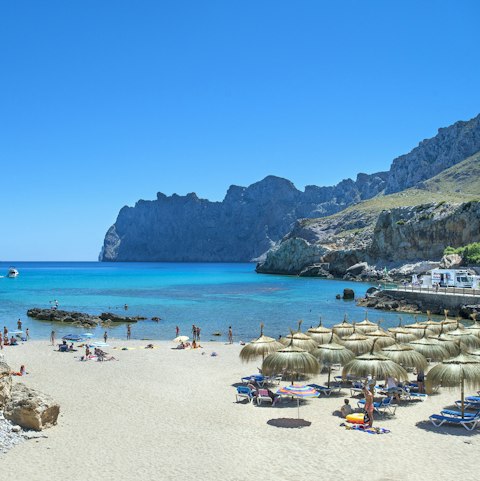 Explore secret coves filled with crystalline waters and sun yourself on powder-soft sands