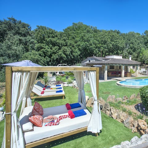 Spend a lazy afternoon on this fabulous Balinese-style day bed – that's certainly our idea of holiday bliss