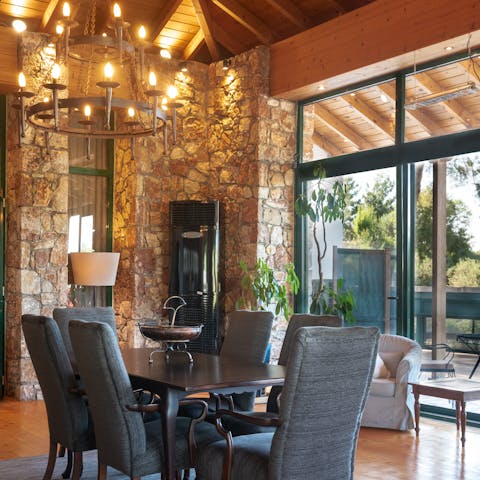 Enjoy meals together under the vaulted ceilings and chandelier